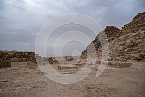 Ruins of the small pyramid of Queen Henutsen near Cheops Pyramid. Giza Plateau, Egypt. UNESCO World Heritage