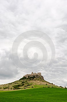 Ruins of spis castle on a cloudy day in springtime