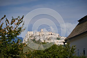 Ruins of the Spisky hrad in eastern slovakia taken from garden in city Spiske podhradie.