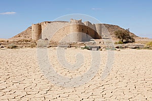 Ruins from a stone Brick Castle near Tabuk City. It was one of the major stations for the Shamiite pilgrim, Saudi Arabia photo