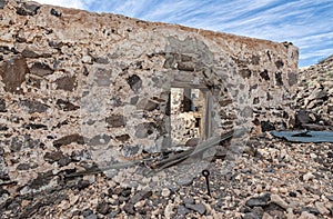 Ruins of a stone building at an abandoned mine near Bonnie Claire, Nevada, USA