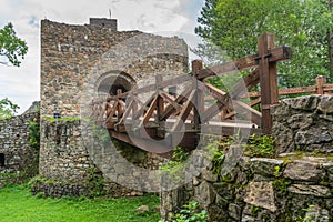 Ruins of Strecno Castle from wooden bridge