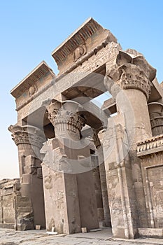 Ruins of the Temple of Kom Ombo in the Nile river at sunset, Egypt