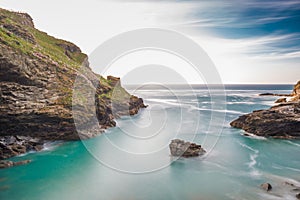 The ruins of Tintagel Castle on Tintagel Island at sunset