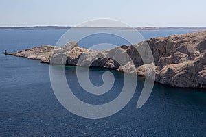 Ruins town of old anicent town Fortica on the edge of the Island of Pag in Croatia photo