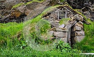 Ruins of a traditional Icelandic turf house photo