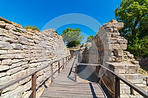 Ruins of Troy ancient city and wooden walkway. Visit Turkiye concept photo