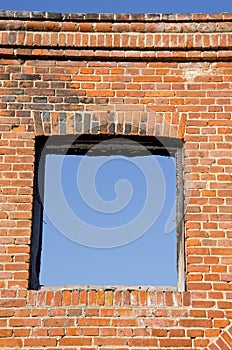 Ruins wall with windows hole