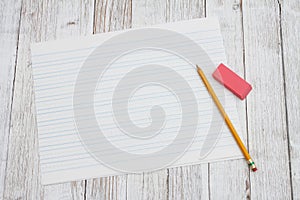 Ruled lined paper with pencil for school photo