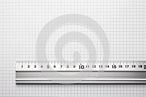 Ruler aligned to a scaled paper