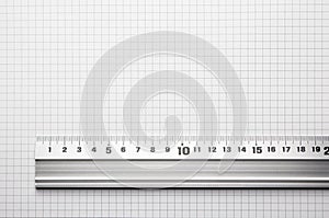 Ruler aligned to a scaled paper photo