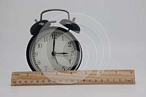 Ruler and clock, space and time, hours and minutes, centimeters and inches. Diet and fitness concept