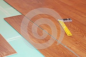 Ruler and laminate on substrate