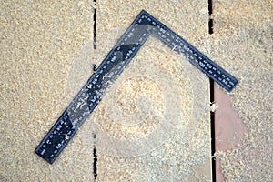 ruler and wooden shavings on the boards