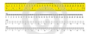 The ruler is yellow, marked in centimeters, inches and combined rectangular shapes. Graduation inch line. Vector graphics photo