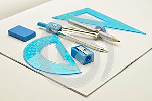 Rulers, compasses, eraser with sharpener for noteb photo