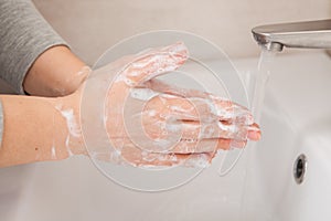 Rules of personal hygiene. How to wash your hands under the tap with water.