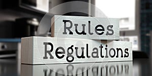 Rules, regulations - words on wooden blocks