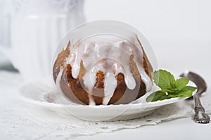 Rum baba cake on plate