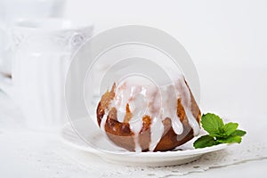 Rum baba cake on plate