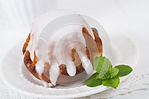 Rum baba cake on plate