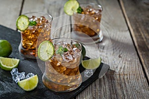 Rum and cola cocktail in glasses