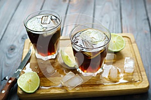 Rum and cola Cuba Libre alcohol cocktail. Refreshing iced longdr