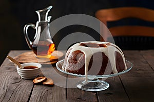 Rum soaked baba showcased on kitchen table, a sweet temptation