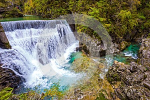 Rumbling waterfall on river photo