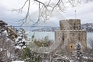 Rumeli Fortress, an old castle with a snow-covered view in winter, Istanbul, TÃÂ¼rkiye. Rumeli Castle with Fatih Sultan Mehmet