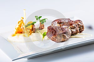 Rump steak. Close up Tender Grilled Beef Meat on White Plate with vegetable decoration.