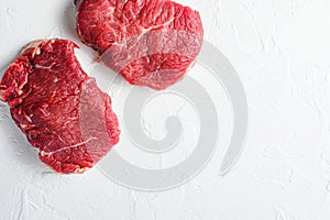 Rump steak, farm organic raw beef meat White textured background. Top view space for price