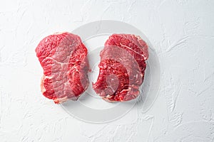 Rump steak, farm organic raw beef meat White textured background. Top view with space for text