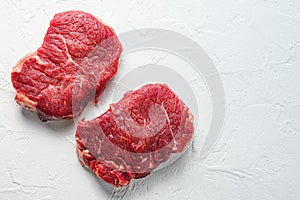 Rump steak, farm organic raw beef meat White textured background. Top view space for text