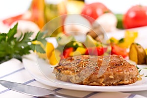 Rump steak with potatoes and vegetables