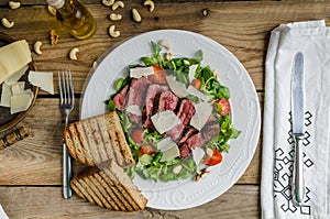 Rump steak with spicy herb butter