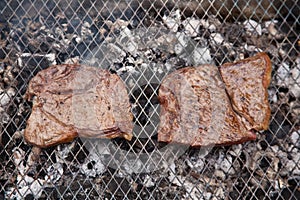 Rump steaks on barbecue