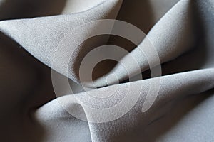 Rumpled dark gray viscose and polyester fabric