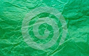 Rumpled paper texture green. Texture of crumpled paper. Crumpled paper. Wrinkles paper