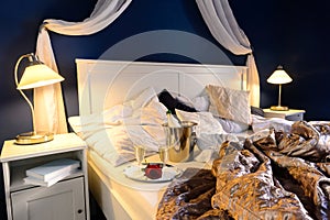 Rumpled sheets hotel bedroom romantic night