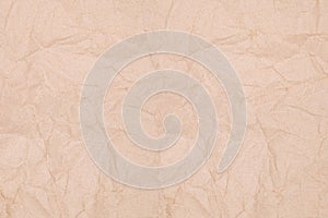 Rumpled texture of old kraft paper, background