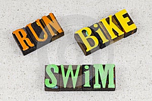 Run bike swim physical fitness marathon healthy wellness