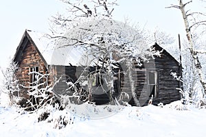 Run Down Farm House In Winter.