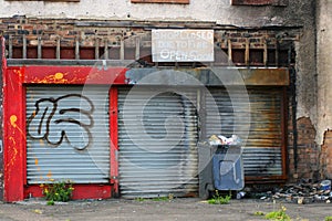 Run down fire damaged shop front