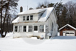 Run down house in winter