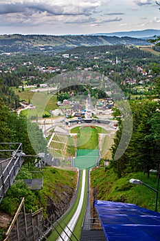 In-run of Great Krokiew ski jumping venue in Zakopane built on the north slope of Krokiew Mountain photo
