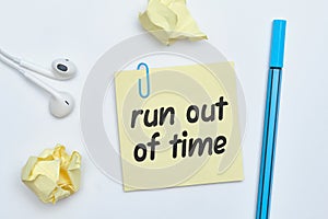 Run out of time - english idiom hand lettering on wooden blocks