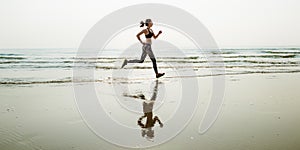 Run Sea Sand Sport Sprint Relax Exercise Beach Concept photo