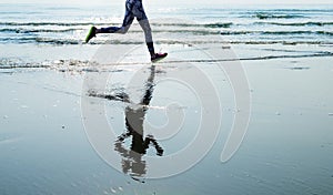 Run Sea Sand Sport Sprint Relax Exercise Beach Concept photo