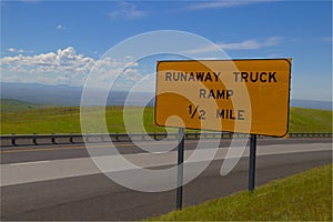 `Runaway Truck Ramp Ahead` Yellow Road Sign